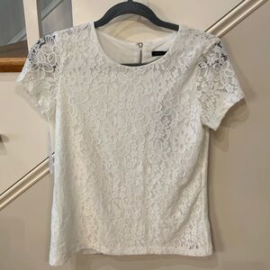 Brand new Tommy Hilfiger XS white lace shortsleeve top Zipper closure in back